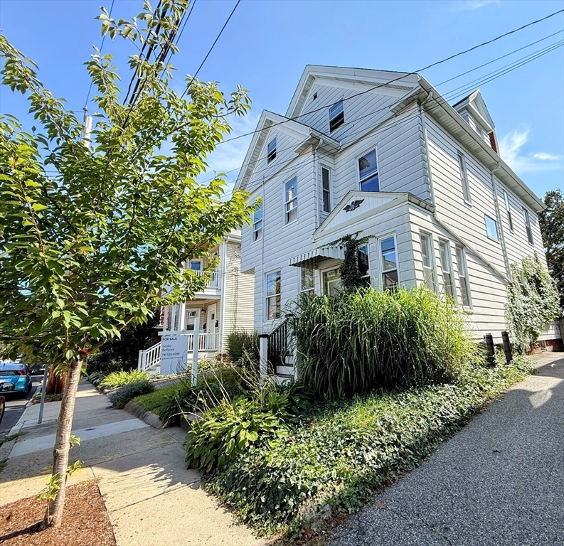 a front view of a multi story residential apartment buildings
