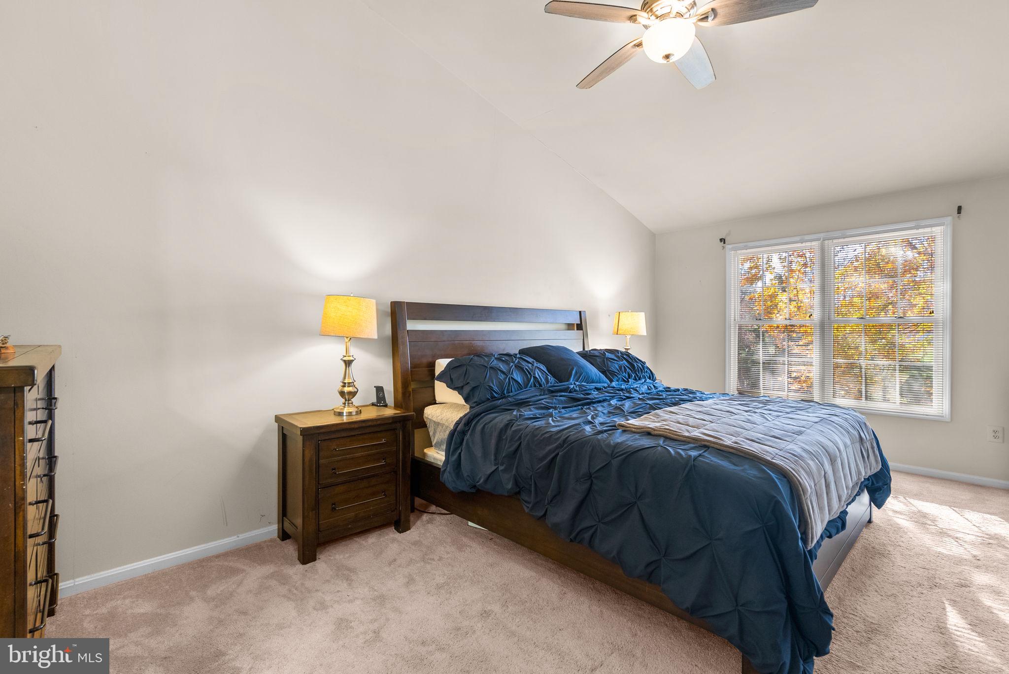 2914 Hatboro Place Upper Marlboro, MD 20772 - Photo 20 of 42 a bed sitting in a bedroom next to a window