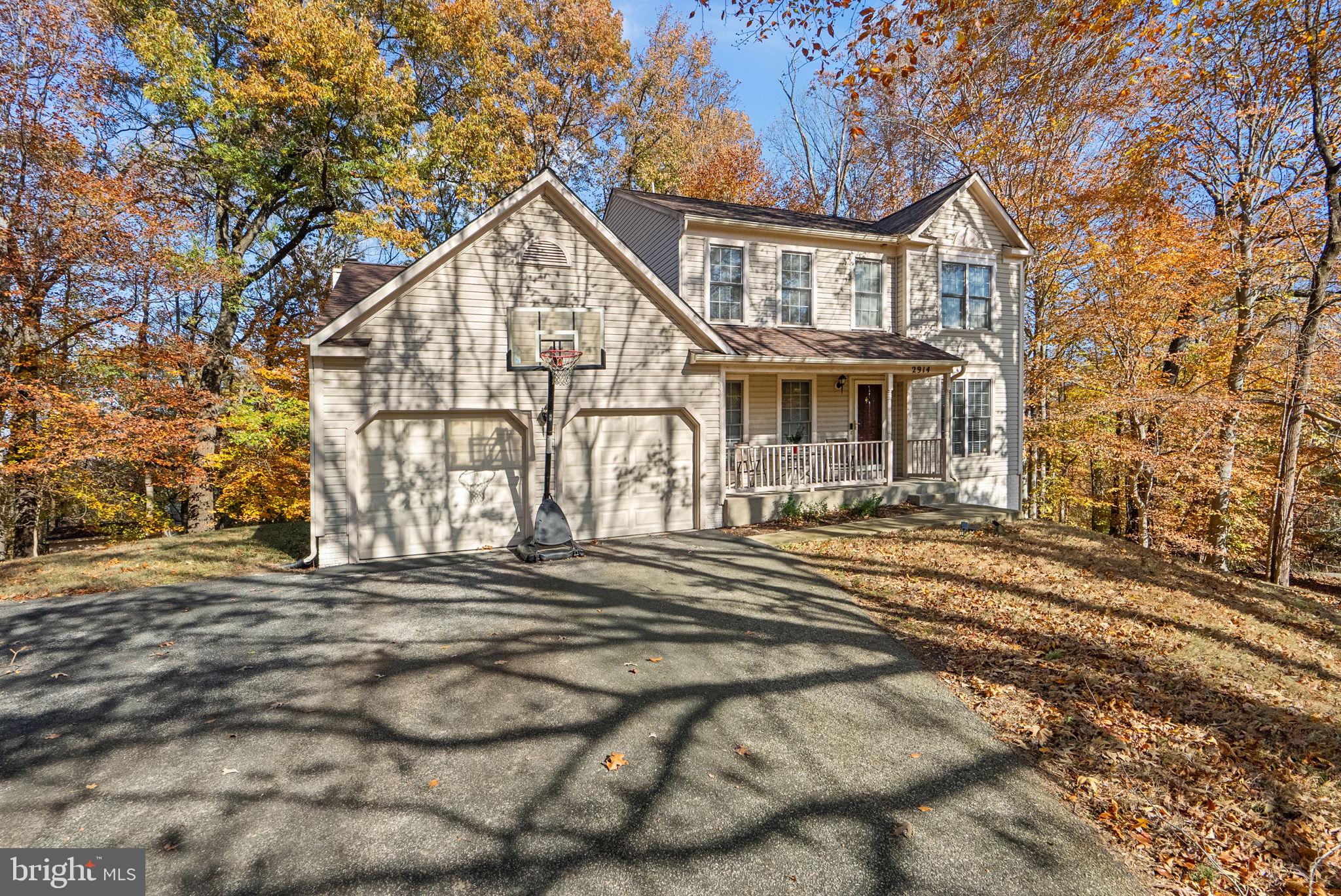 2914 Hatboro Place Upper Marlboro, MD 20772 - Photo 2 of 42 a view of a white house with large windows and a small yard