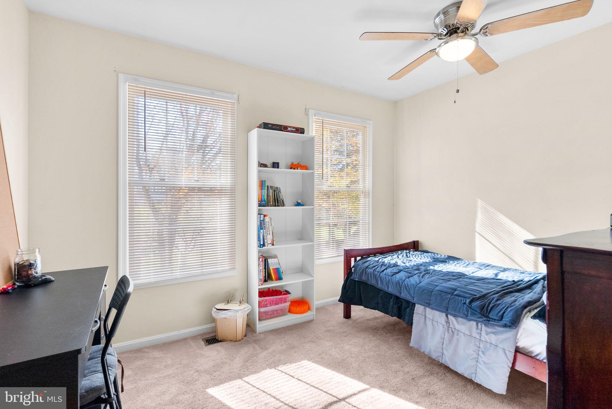2914 Hatboro Place Upper Marlboro, MD 20772 - Photo 23 of 42 a bedroom with furniture and a window
