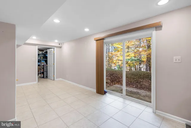 a view or kitchen with furniture and window