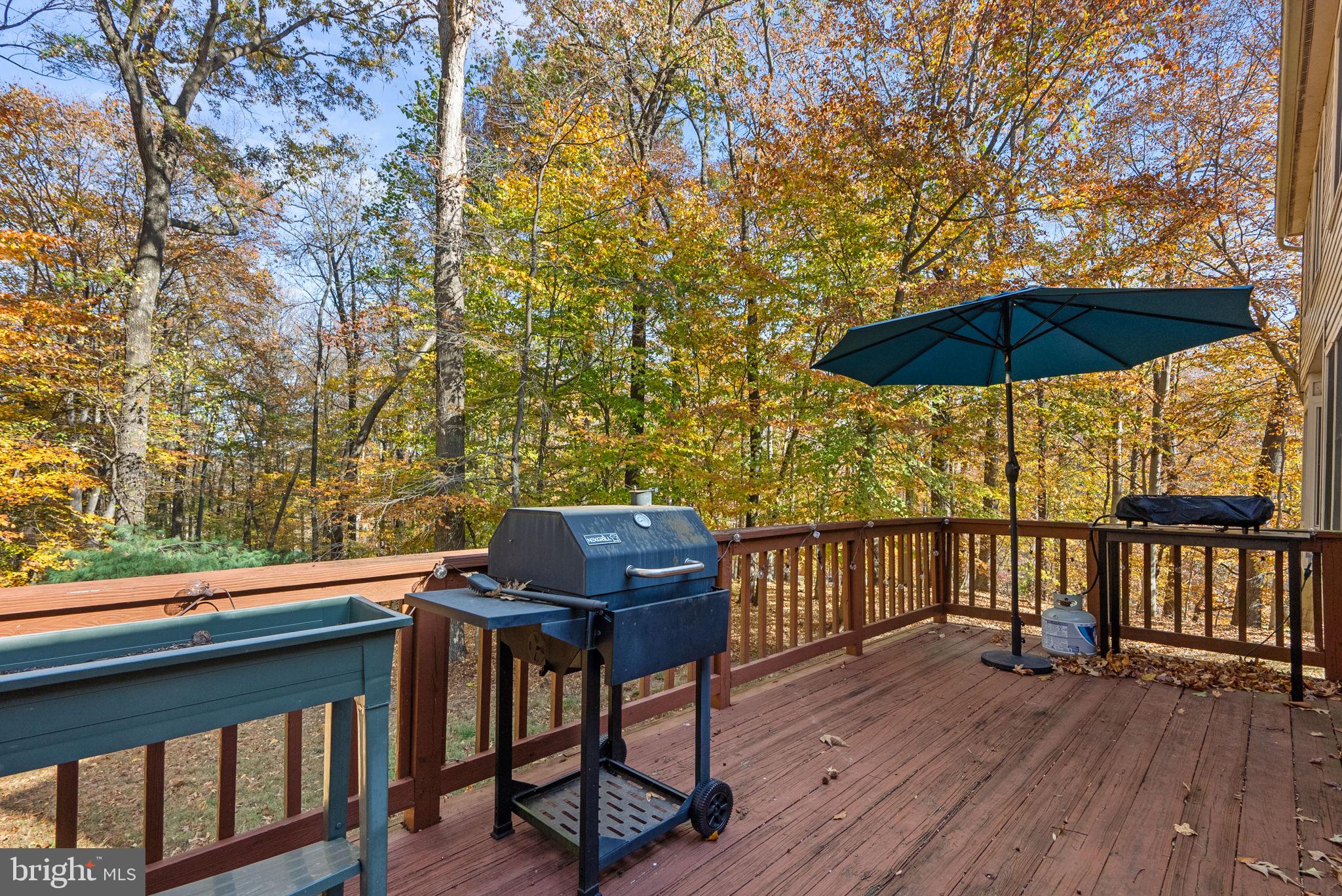 2914 Hatboro Place Upper Marlboro, MD 20772 - Photo 37 of 42 a view of a balcony with furniture and wooden floor