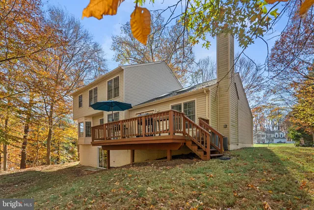 a view of a field with trees in front of it