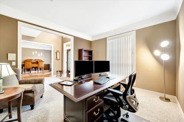 a view of a workspace with furniture