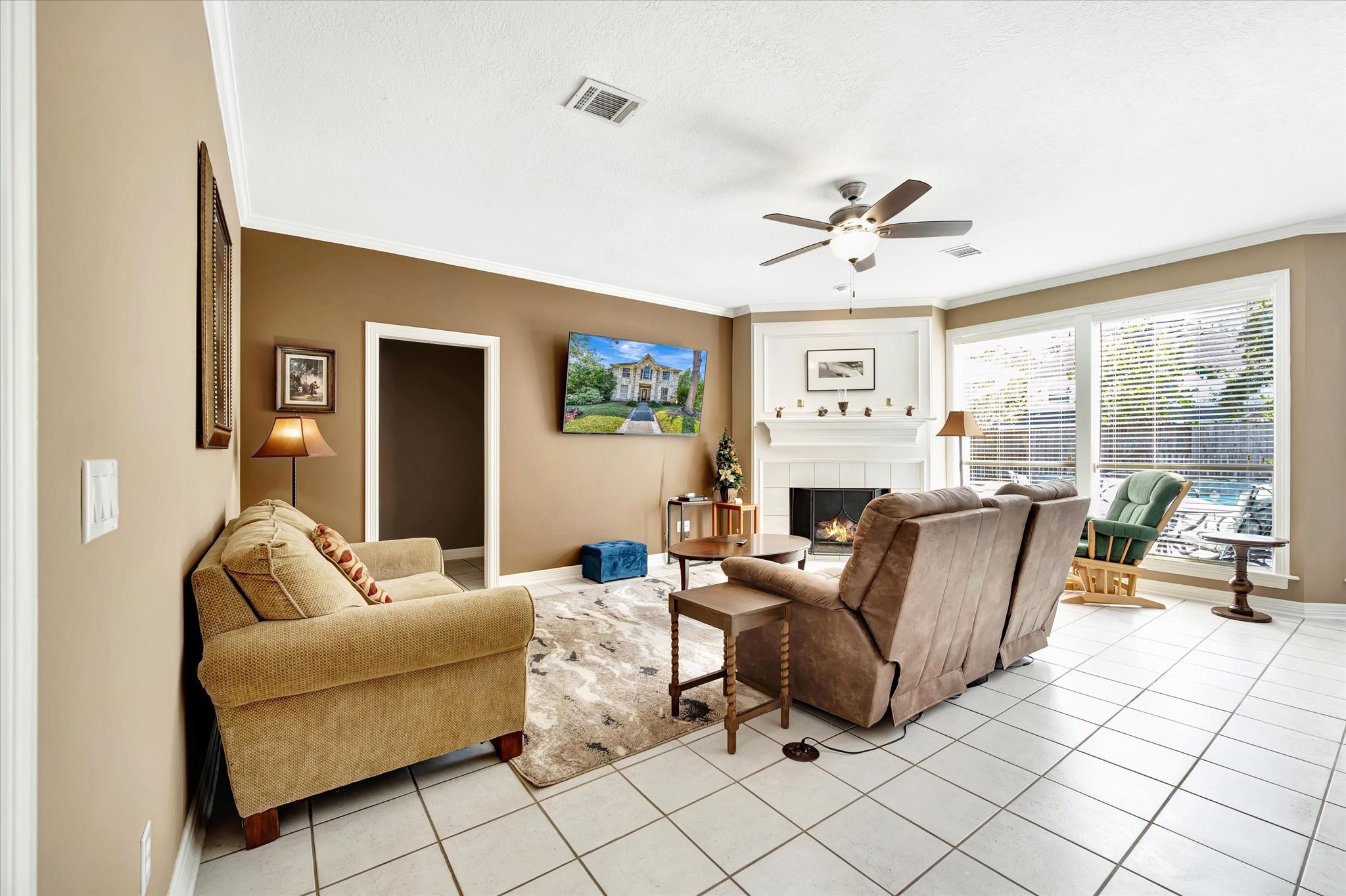 14934 Wilderness Cliff Court Houston, TX 77062 - Photo 12 of 50 a living room with furniture and a large window