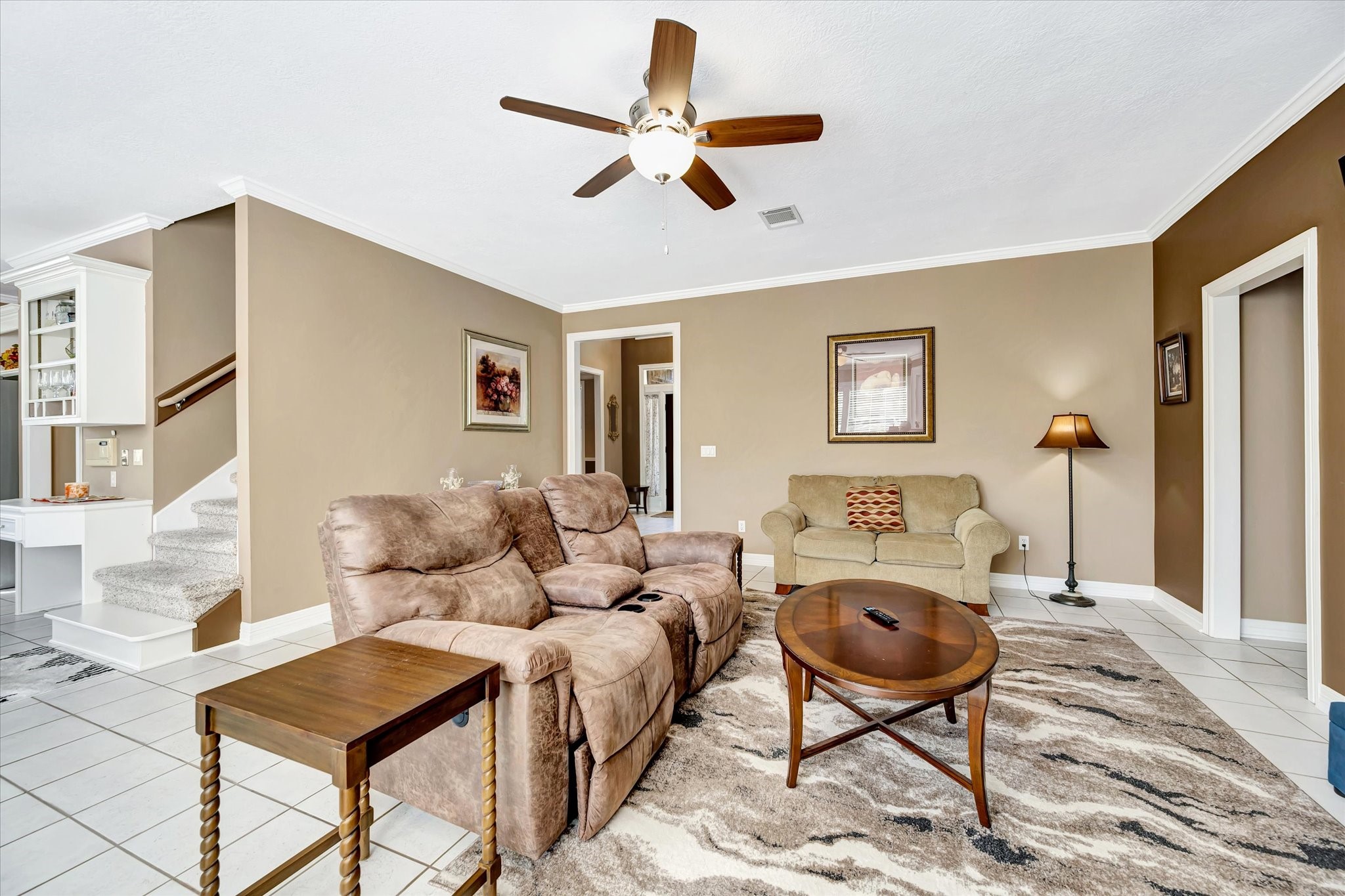 14934 Wilderness Cliff Court Houston, TX 77062 - Photo 16 of 50 a living room with furniture and a rug