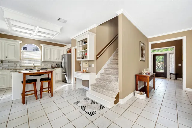 a living room with furniture and a table
