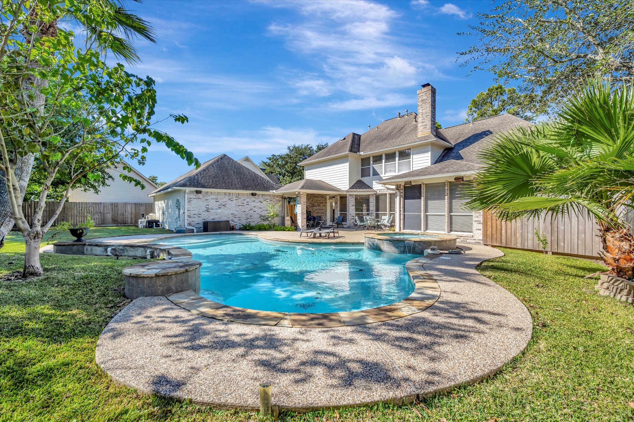 14934 Wilderness Cliff Court Houston, TX 77062 - Photo 5 of 50 a view of a house with outdoor space