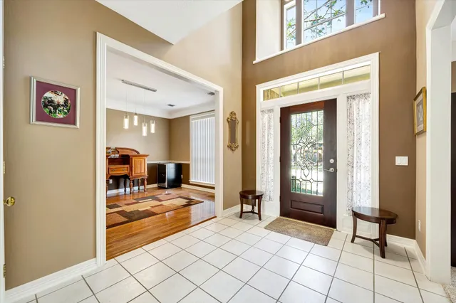 a view of a livingroom with furniture and front door