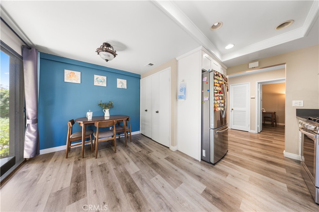 11 Palos, Unit 55 Irvine, CA 92612 - Photo 9 of 25 a view of a livingroom with furniture and wooden floor