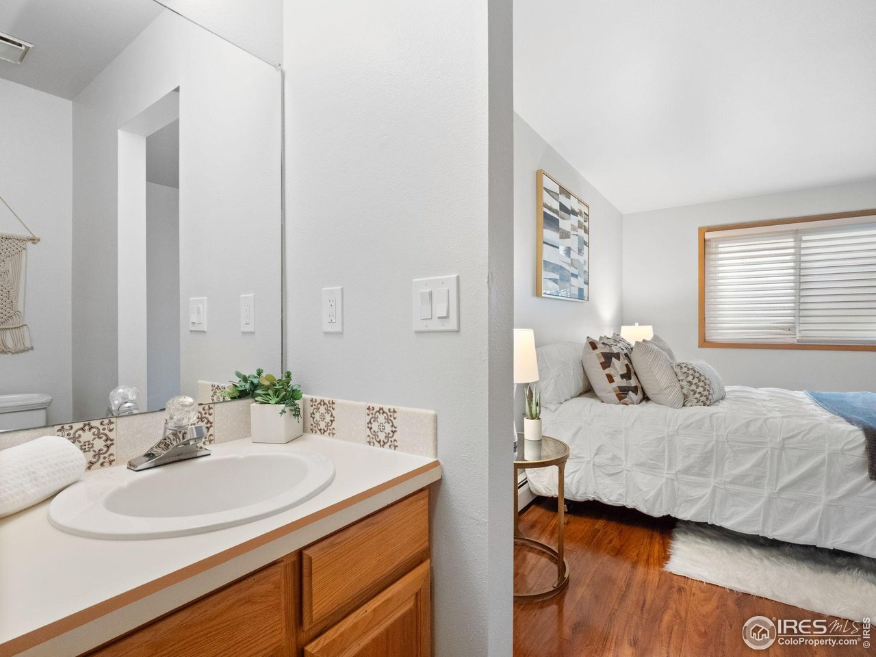 2680 Fremont Street Boulder, CO 80304 - Photo 15 of 28 a bedroom with a sink and a mirror