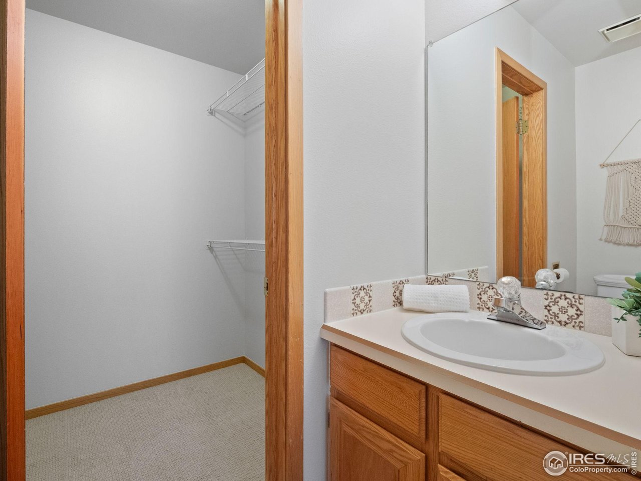 2680 Fremont Street Boulder, CO 80304 - Photo 16 of 28 a bathroom with a sink and a mirror
