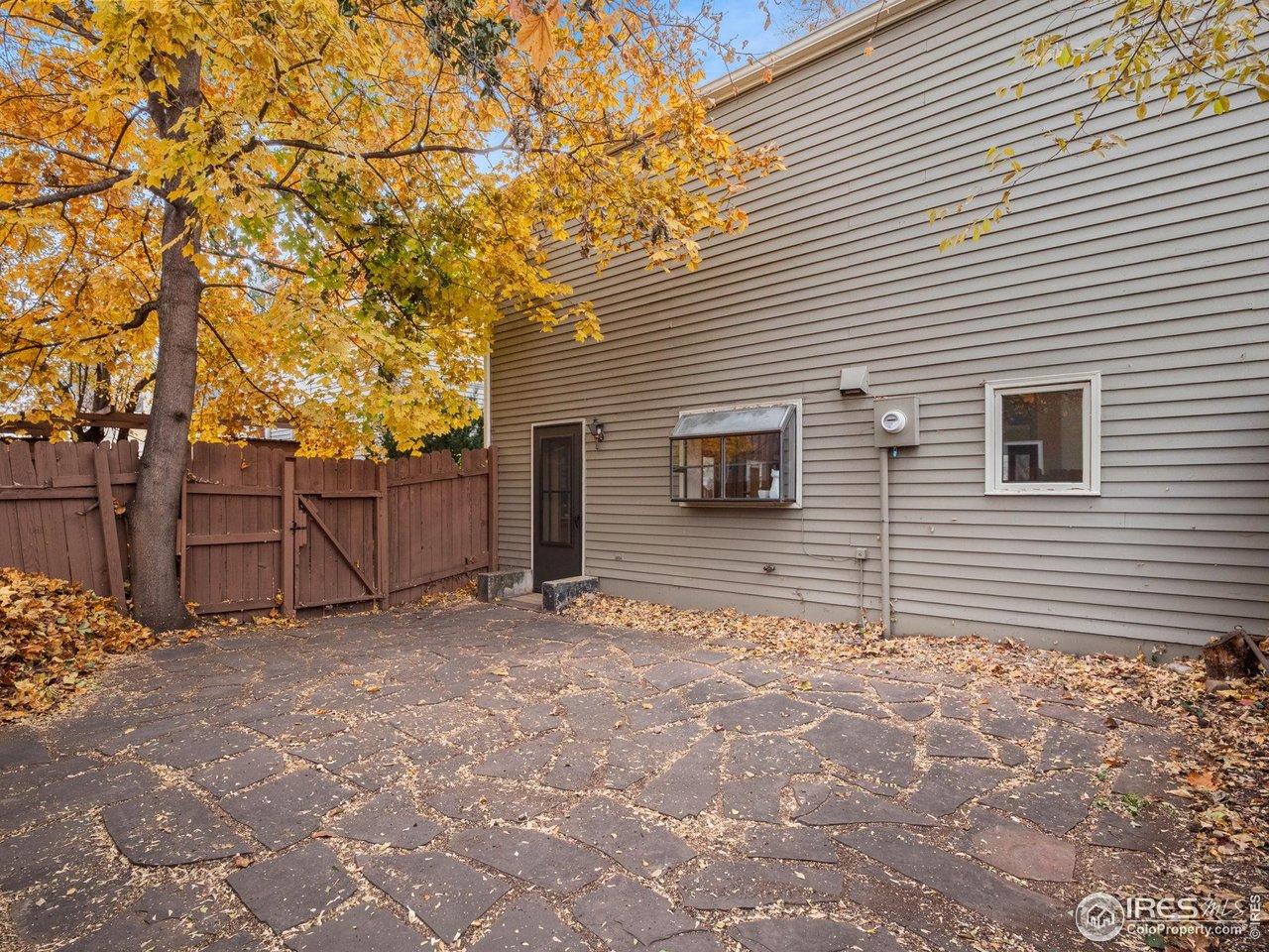 2680 Fremont Street Boulder, CO 80304 - Photo 25 of 28 a backyard of a house with large tree