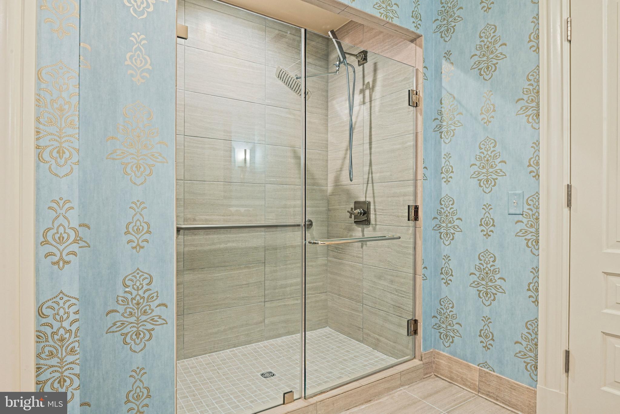6900 Fleetwood Road, Unit 318 McLean, VA 22101 - Photo 24 of 61 Primary Suite Bathroo m