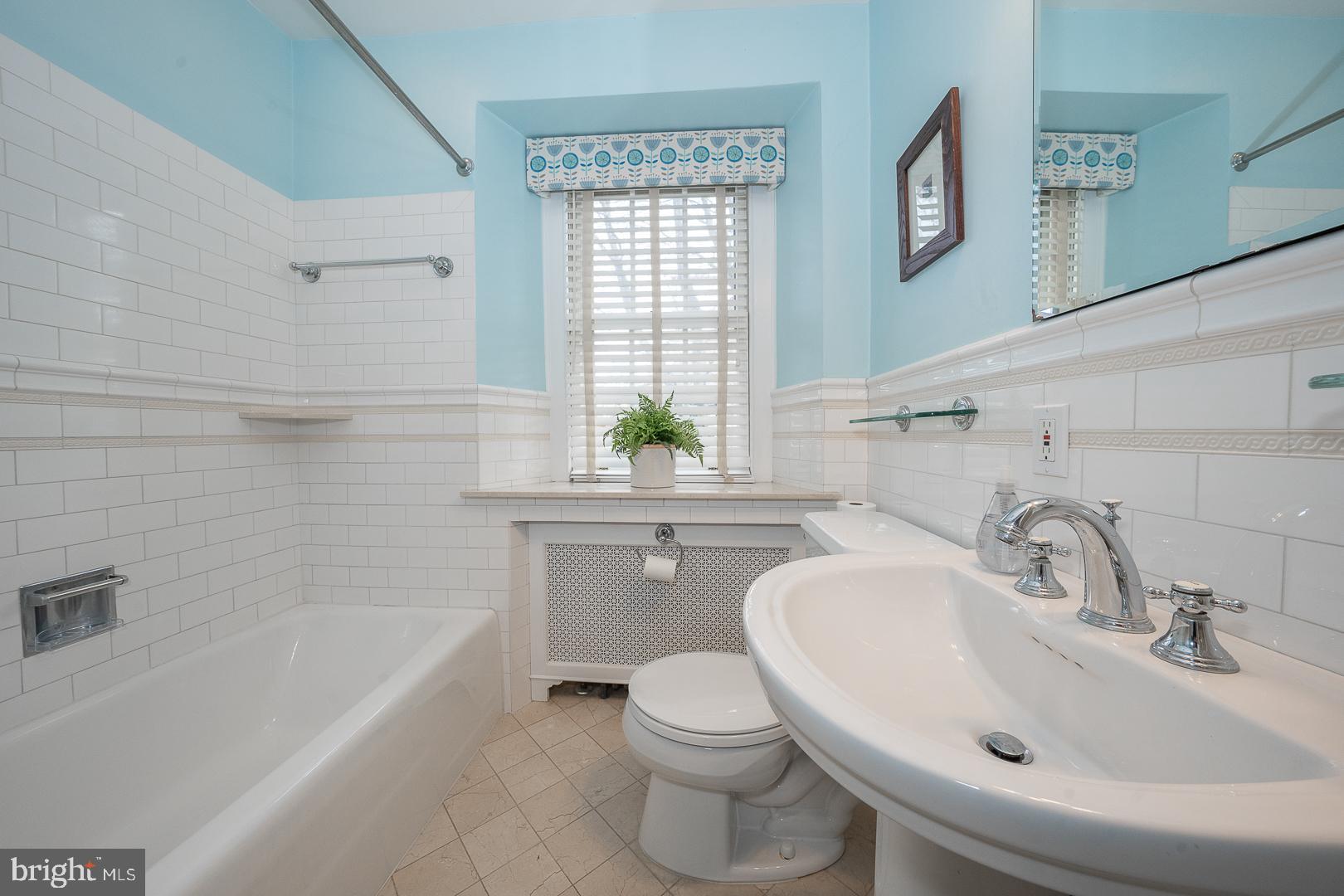 261 Kent Road Wynnewood, PA 19096 - Photo 45 of 98 a bathroom with a sink a toilet and bathtub