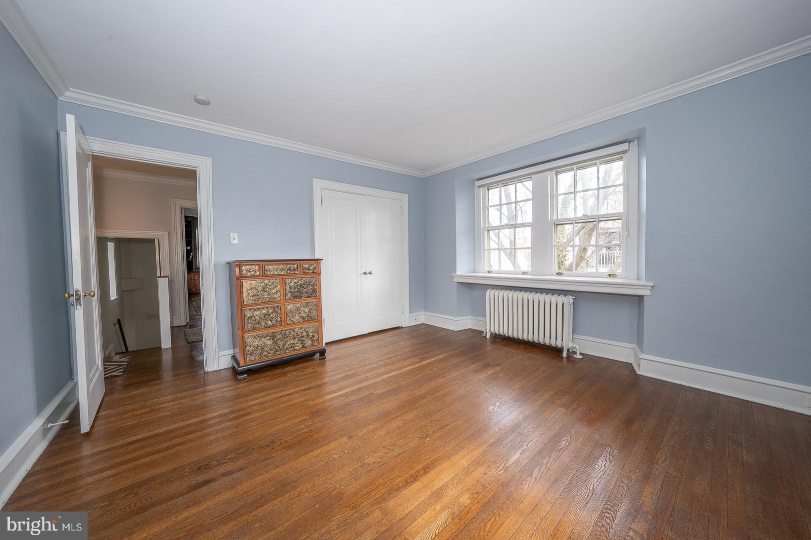 261 Kent Road Wynnewood, PA 19096 - Photo 47 of 98 an empty room with wooden floor and windows