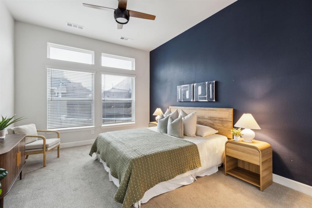 2417 Robin Way Northlake, TX 76247 - Photo 12 of 27 a bedroom with a bed a table and chair