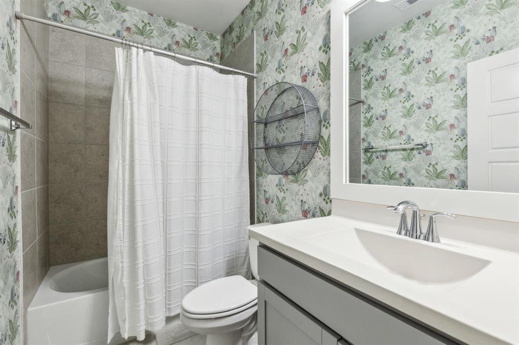 2417 Robin Way Northlake, TX 76247 - Photo 17 of 27 a bathroom with a sink toilet and shower
