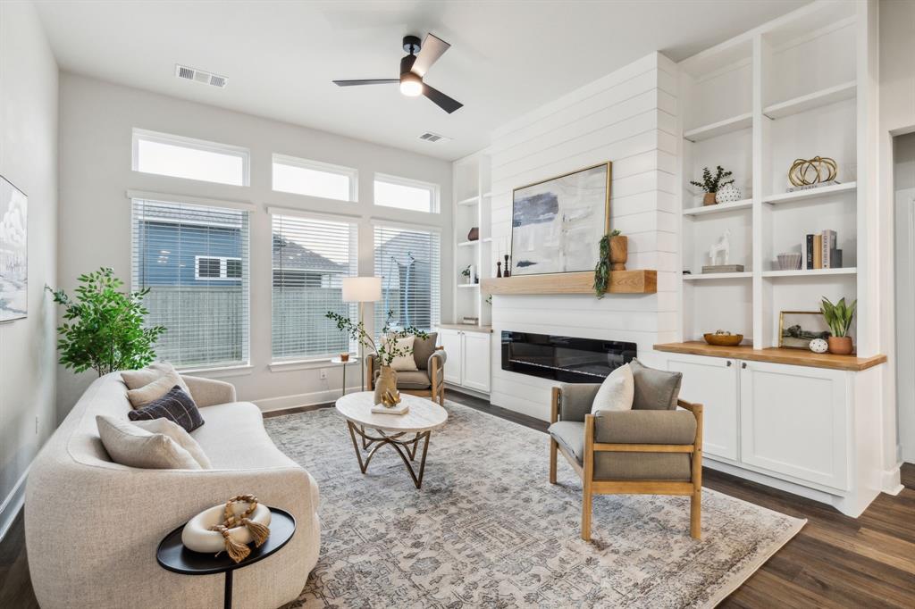 2417 Robin Way Northlake, TX 76247 - Photo 2 of 27 a living room with furniture and a fireplace