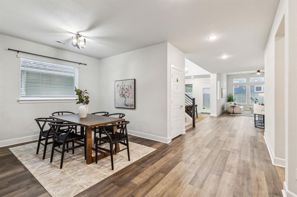 2417 Robin Way Northlake, TX 76247 - Photo 25 of 27 a view of a dining room with furniture and wooden floor