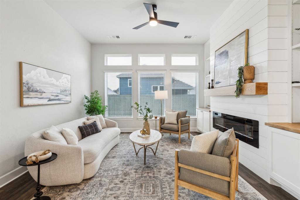 2417 Robin Way Northlake, TX 76247 - Photo 3 of 27 a living room with furniture and a fireplace