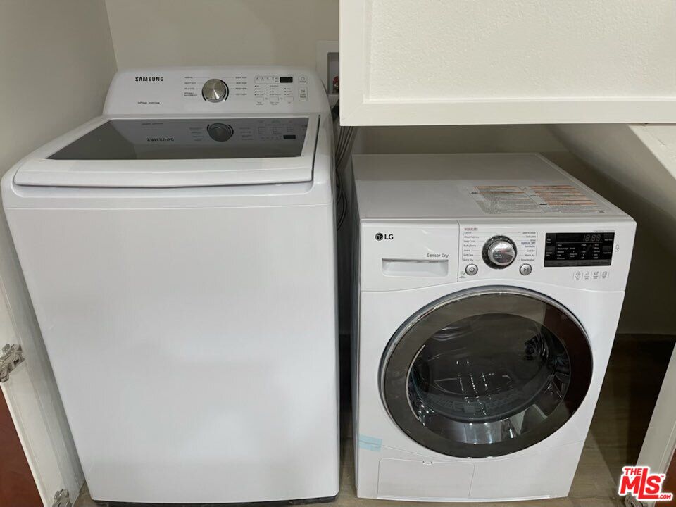 7327 Willoughby Avenue, Unit 6 Los Angeles, CA 90046 - Photo 22 of 24 a utility room with dryer and washer
