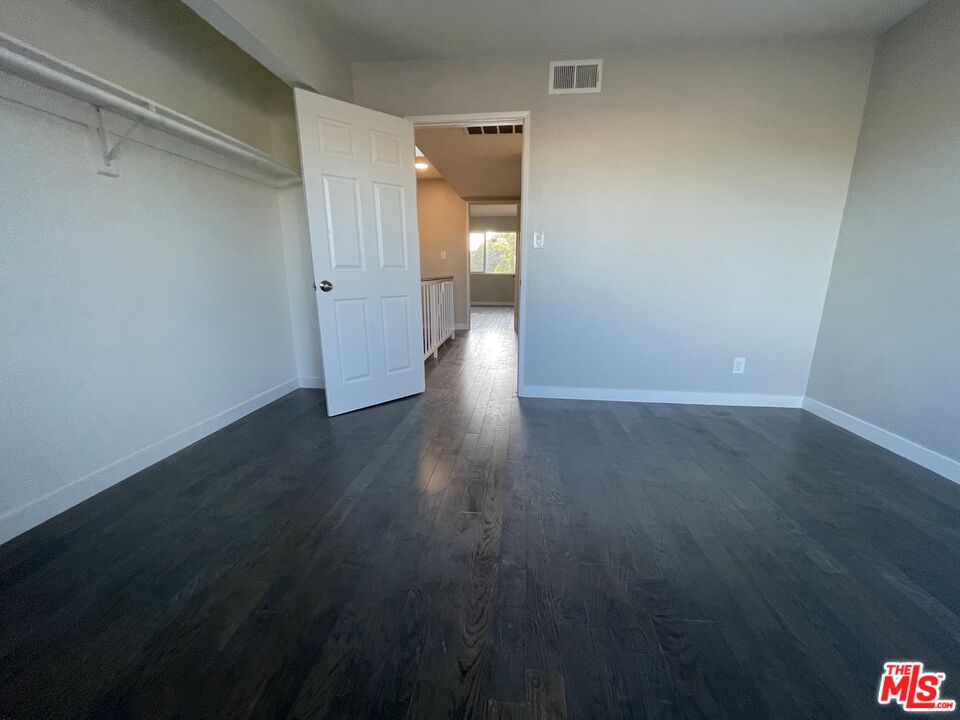 7327 Willoughby Avenue, Unit 6 Los Angeles, CA 90046 - Photo 9 of 24 a view of a room with wooden floor