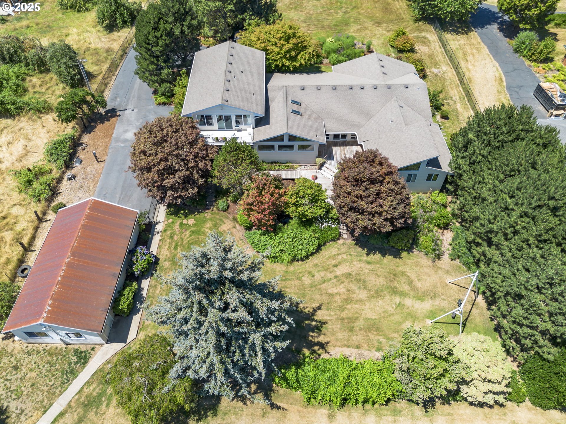 19117 Northeast 29th Avenue Ridgefield, WA 98642 - Photo 45 of 48 an aerial view of a house with a yard and garden