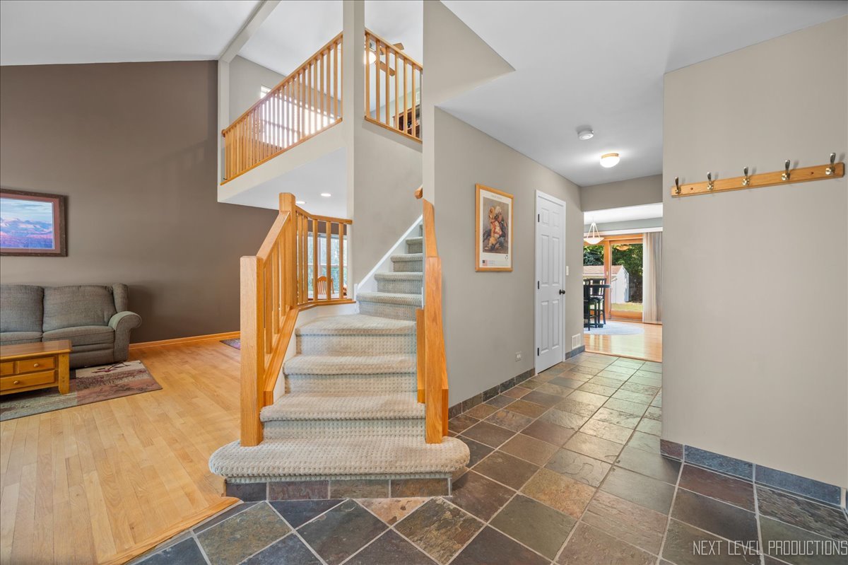 1244 Churchill Road Bartlett, IL 60103 - Photo 4 of 33 a view of entryway and hall