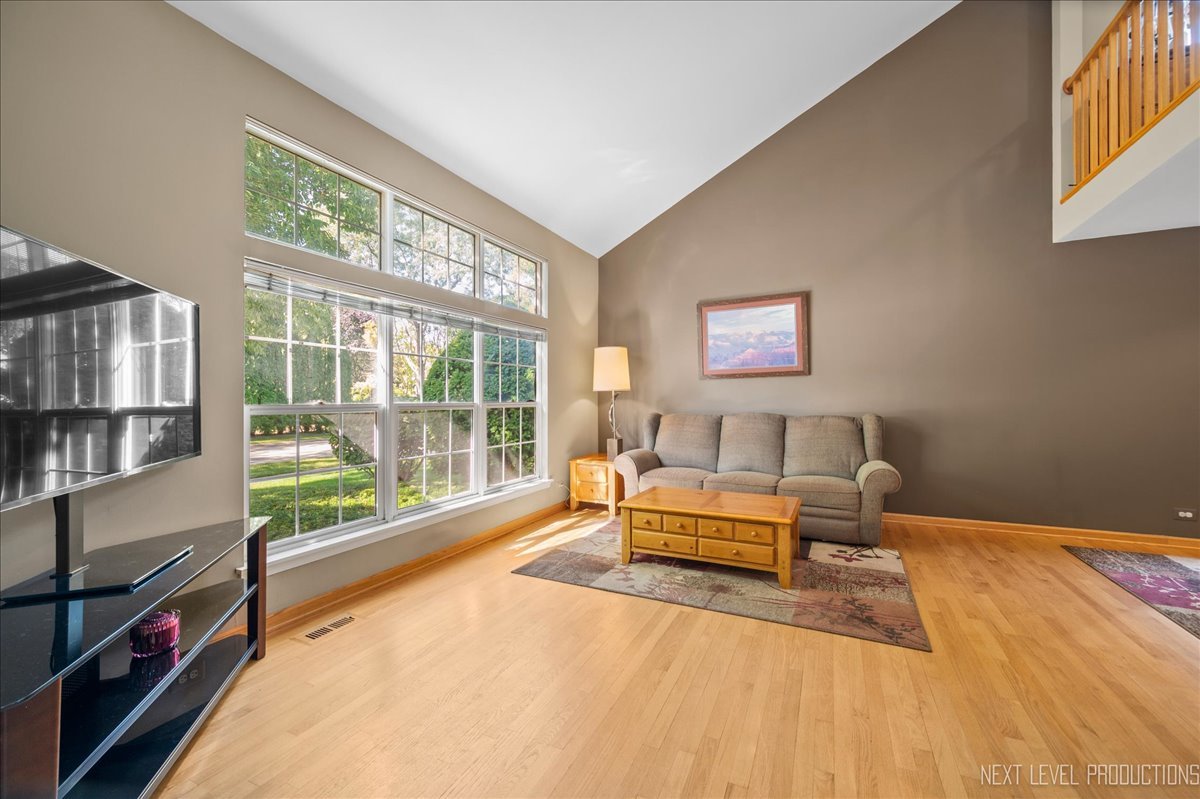 1244 Churchill Road Bartlett, IL 60103 - Photo 6 of 33 a bedroom with a bed and large window