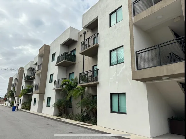 a view of a building along the street