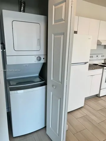a utility room with washer and dryer