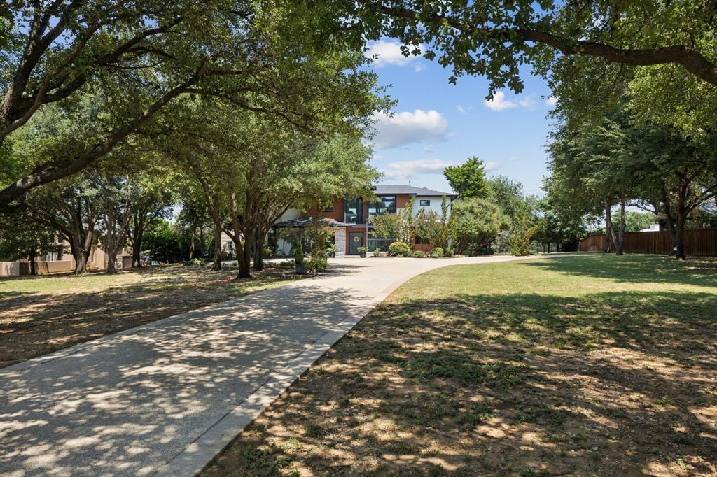 1006 Quail Run Road Southlake, TX 76092 - Photo 2 of 40 a view of road with trees