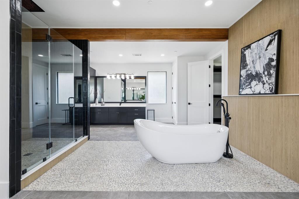 1006 Quail Run Road Southlake, TX 76092 - Photo 23 of 40 a living room with a couch and a glass door