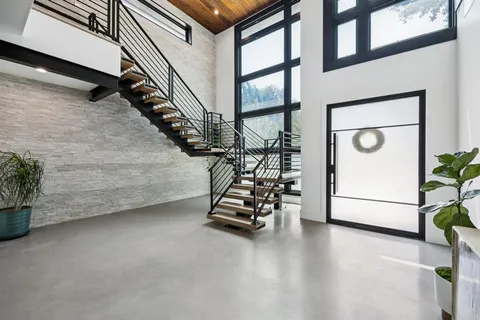 a view of a room with staircase