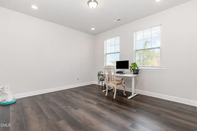a workspace with wooden floor
