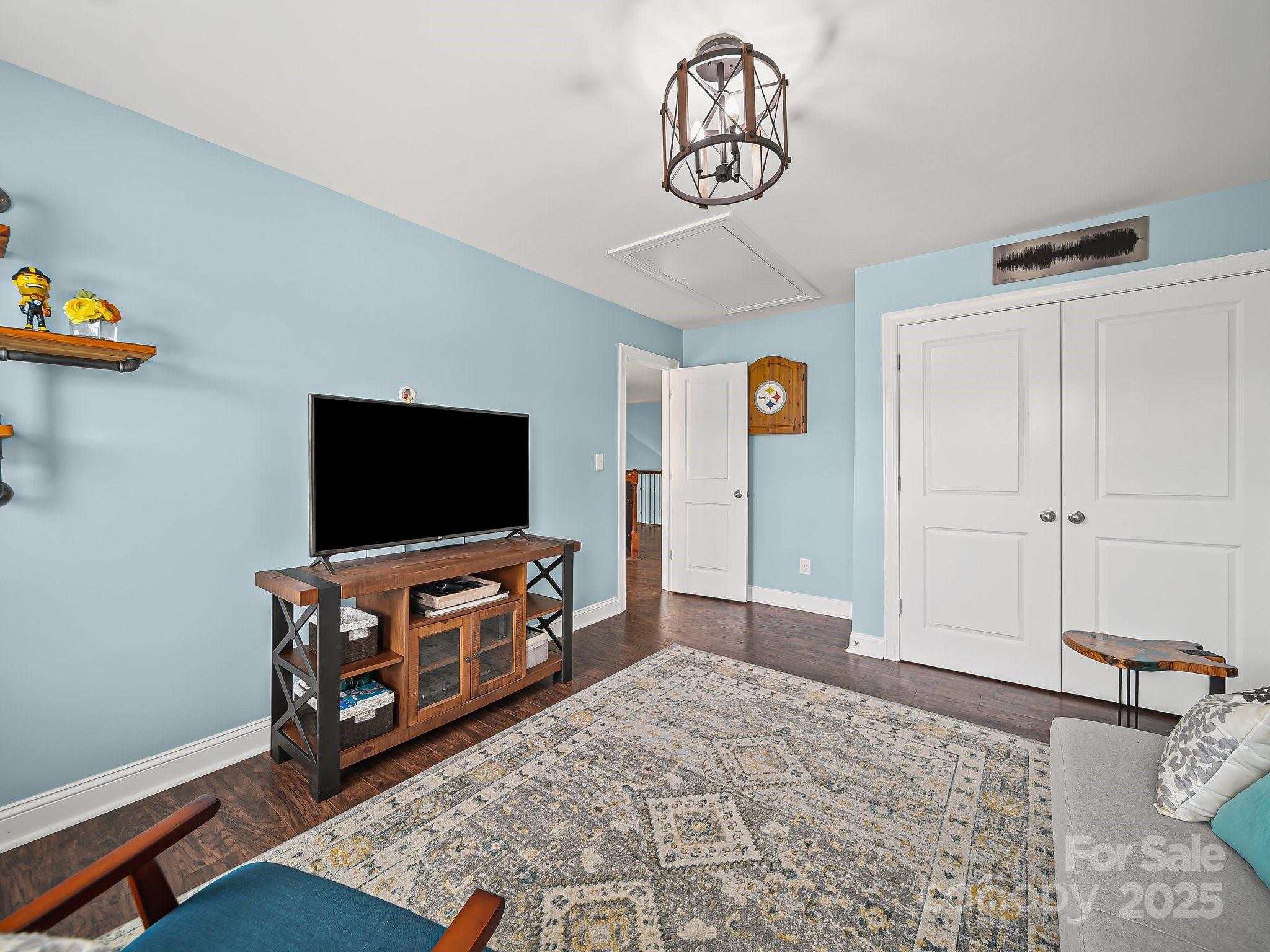9639 Estridge Lane Concord, NC 28027 - Photo 29 of 48 a view of a livingroom with furniture and a flat screen tv
