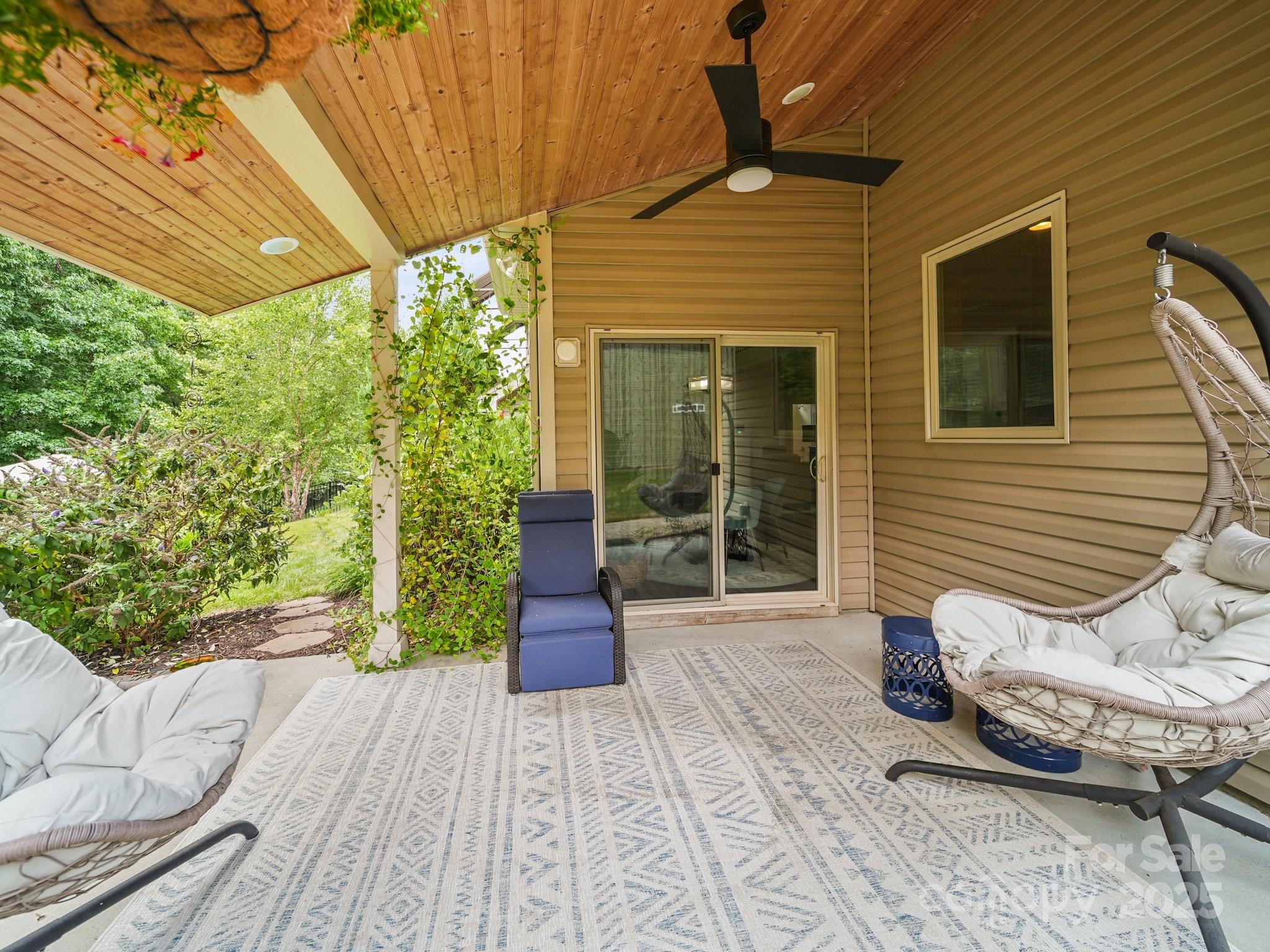 9639 Estridge Lane Concord, NC 28027 - Photo 38 of 48 a porch with seating space