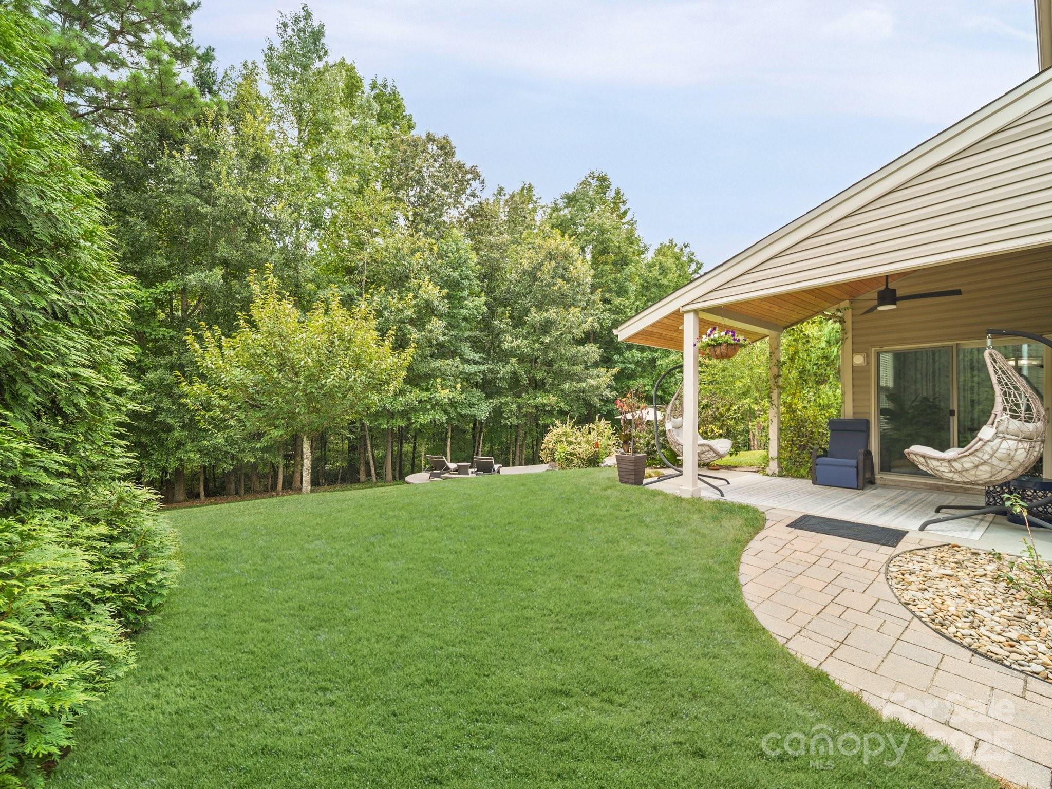 9639 Estridge Lane Concord, NC 28027 - Photo 40 of 48 a view of a house with backyard