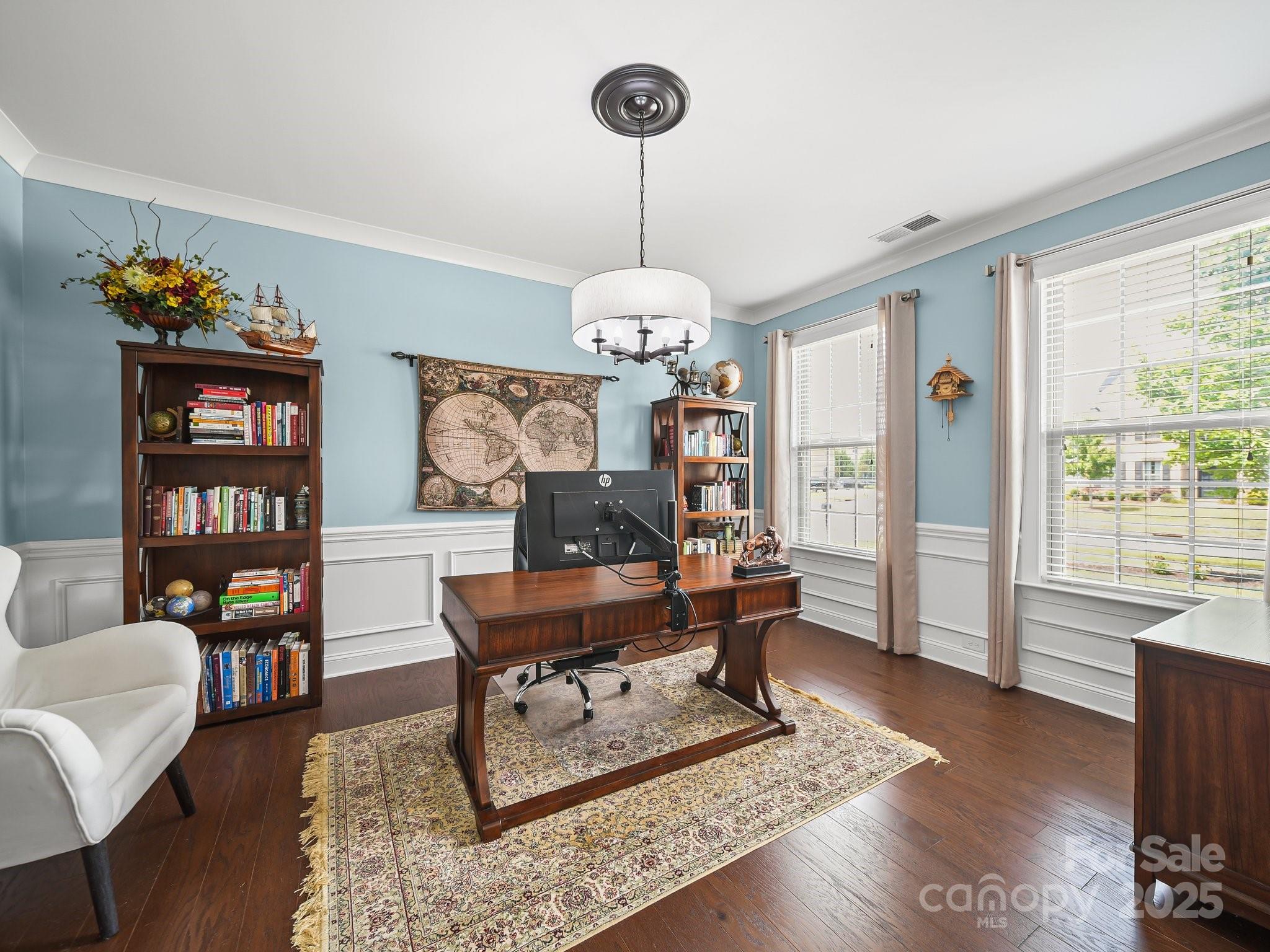 9639 Estridge Lane Concord, NC 28027 - Photo 9 of 48 a living room with furniture and a wooden floor