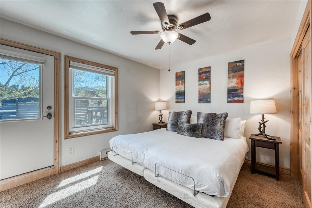 200 North Ridge Street, Unit R A Breckenridge, CO 80424 - Photo 27 of 38 a bedroom with a large bed and a window