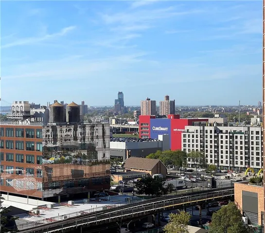 a view of city with tall buildings