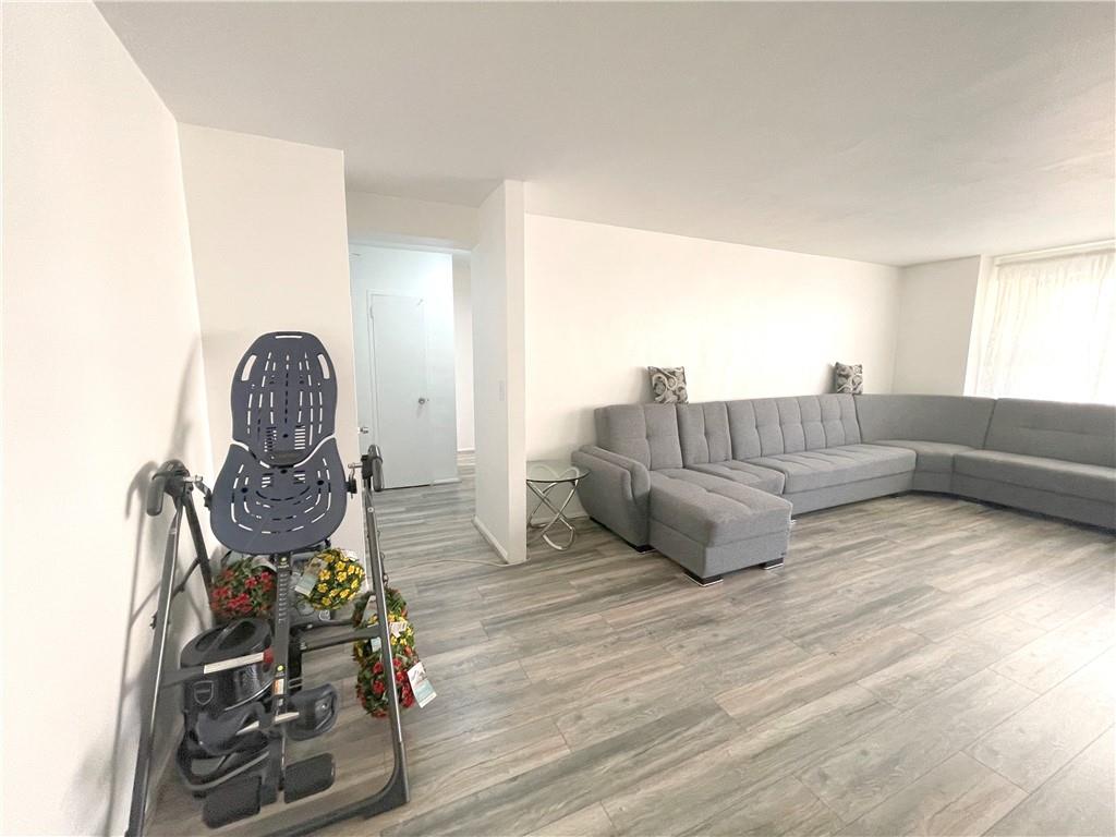 2940 West 5th Street, Unit 14C Brooklyn, NY 11224 - Photo 8 of 26 a living room with furniture