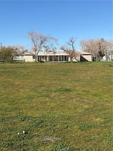 a view of a terrace with sitting area