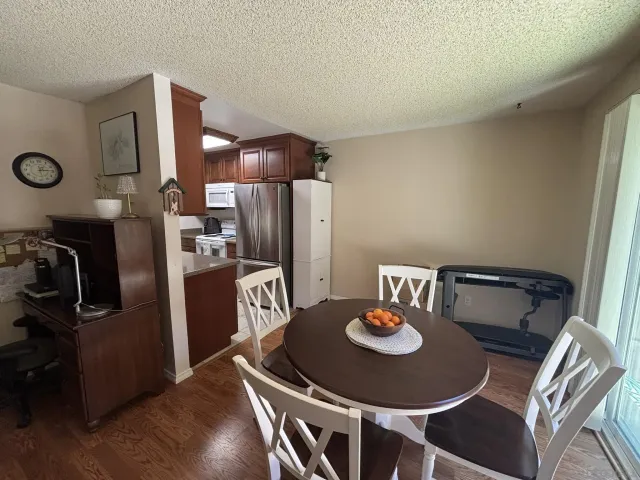 a table and chairs in a kitchen