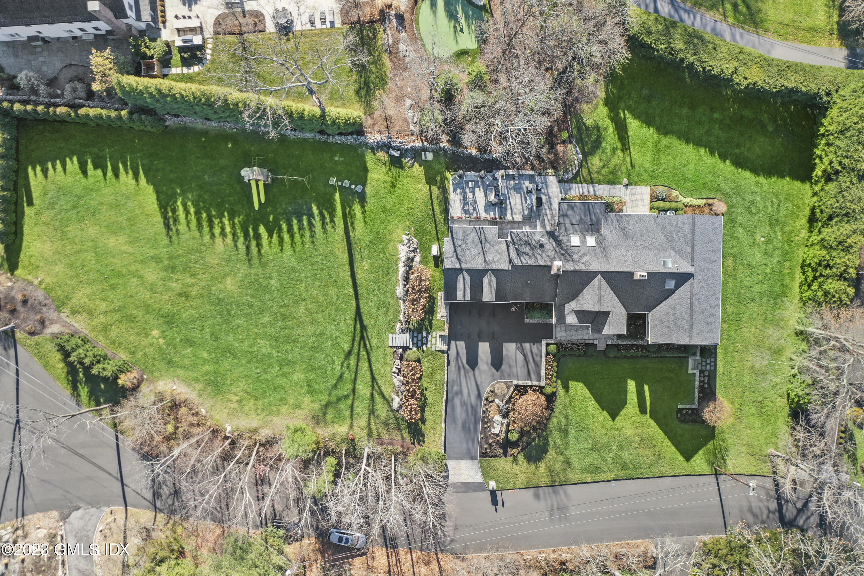 25 Rustic View Road Greenwich, CT 06830 - Photo 36 of 40 an aerial view of a house with a yard and lake view
