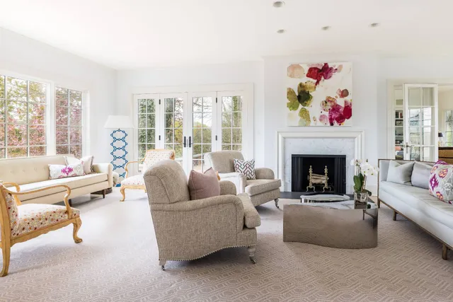 a living room with furniture and window