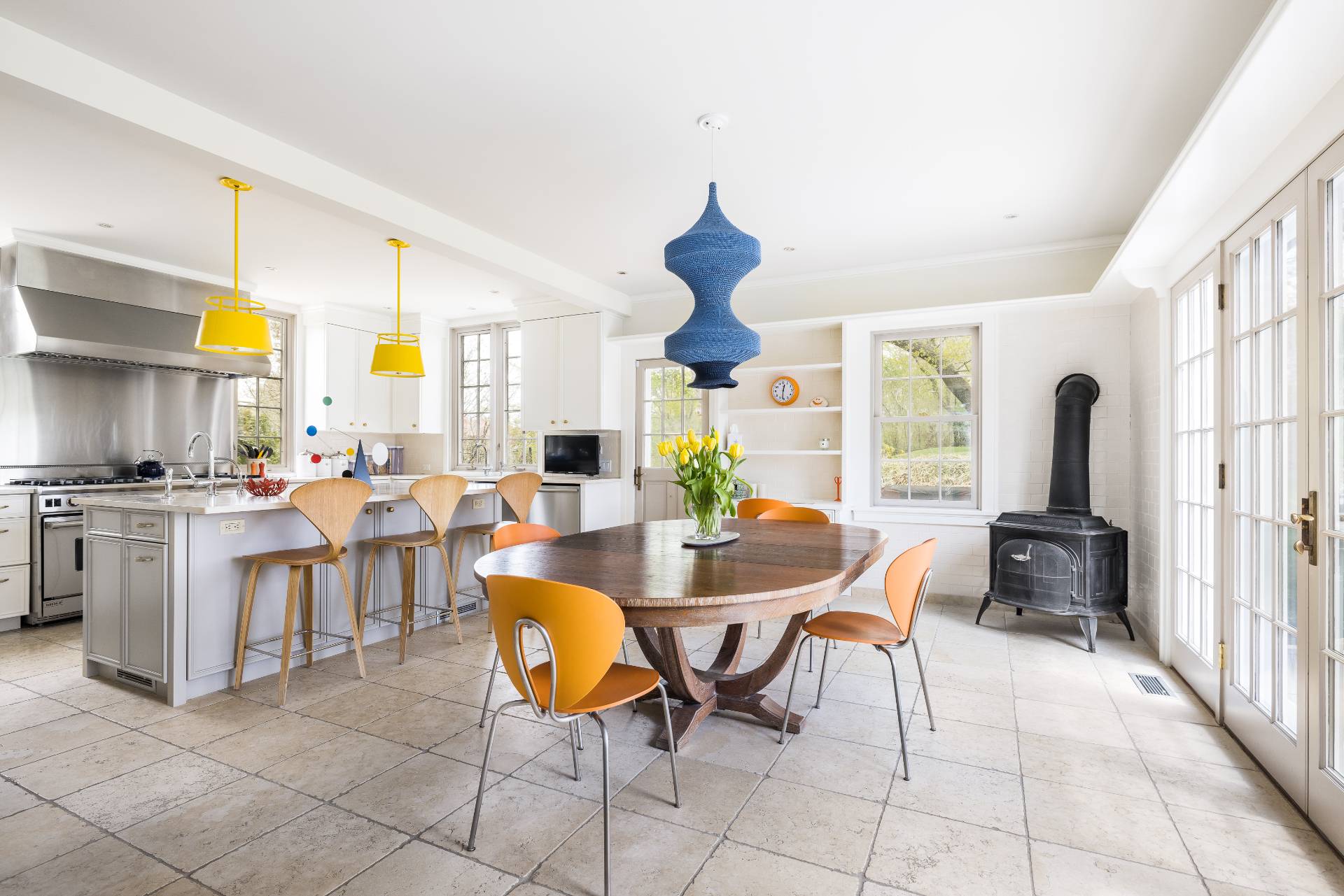 17 Apaquogue Road East Hampton, NY 11937 - Photo 19 of 37 a view of a dining room with furniture window and outside view