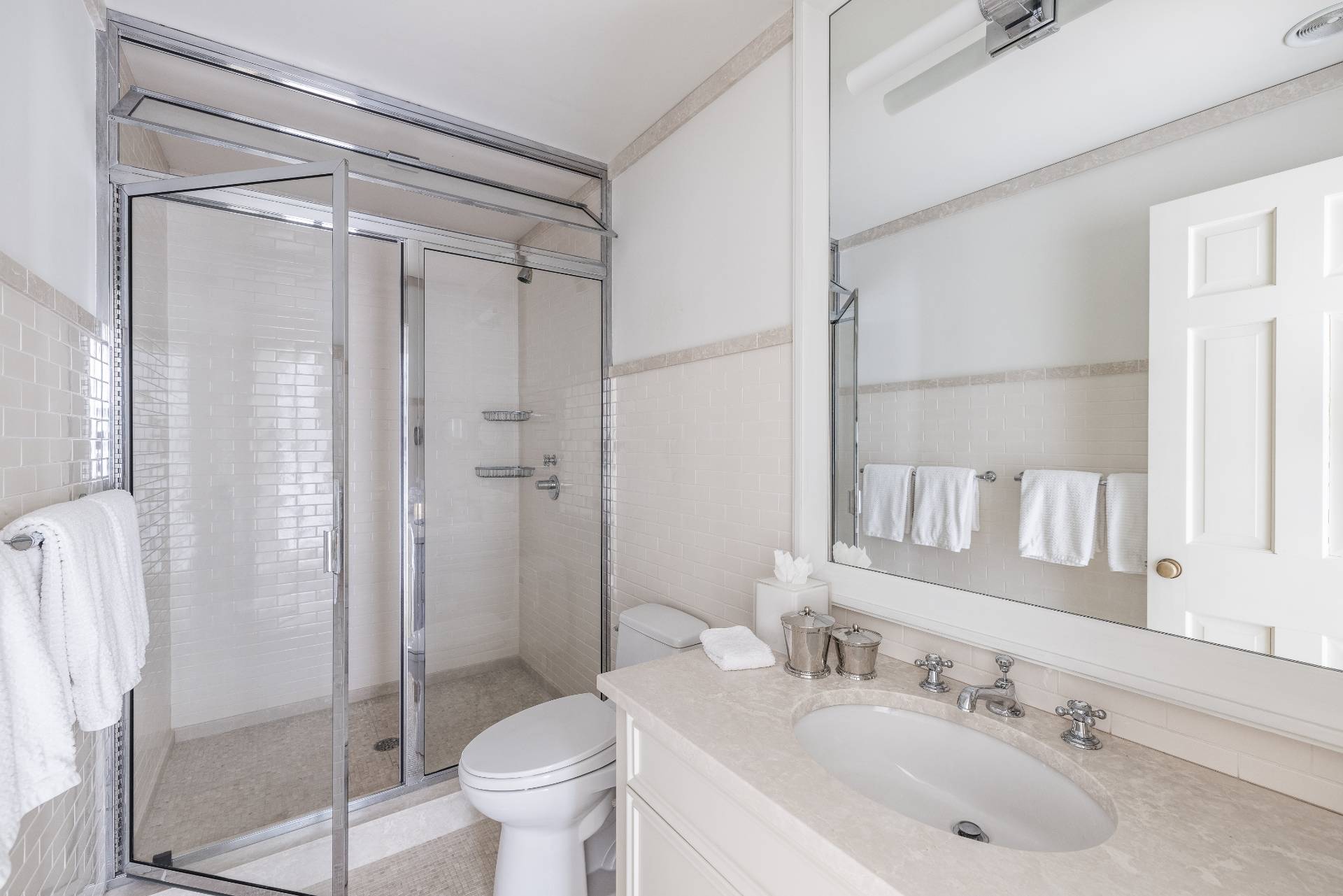 17 Apaquogue Road East Hampton, NY 11937 - Photo 26 of 37 a bathroom with a sink toilet and shower
