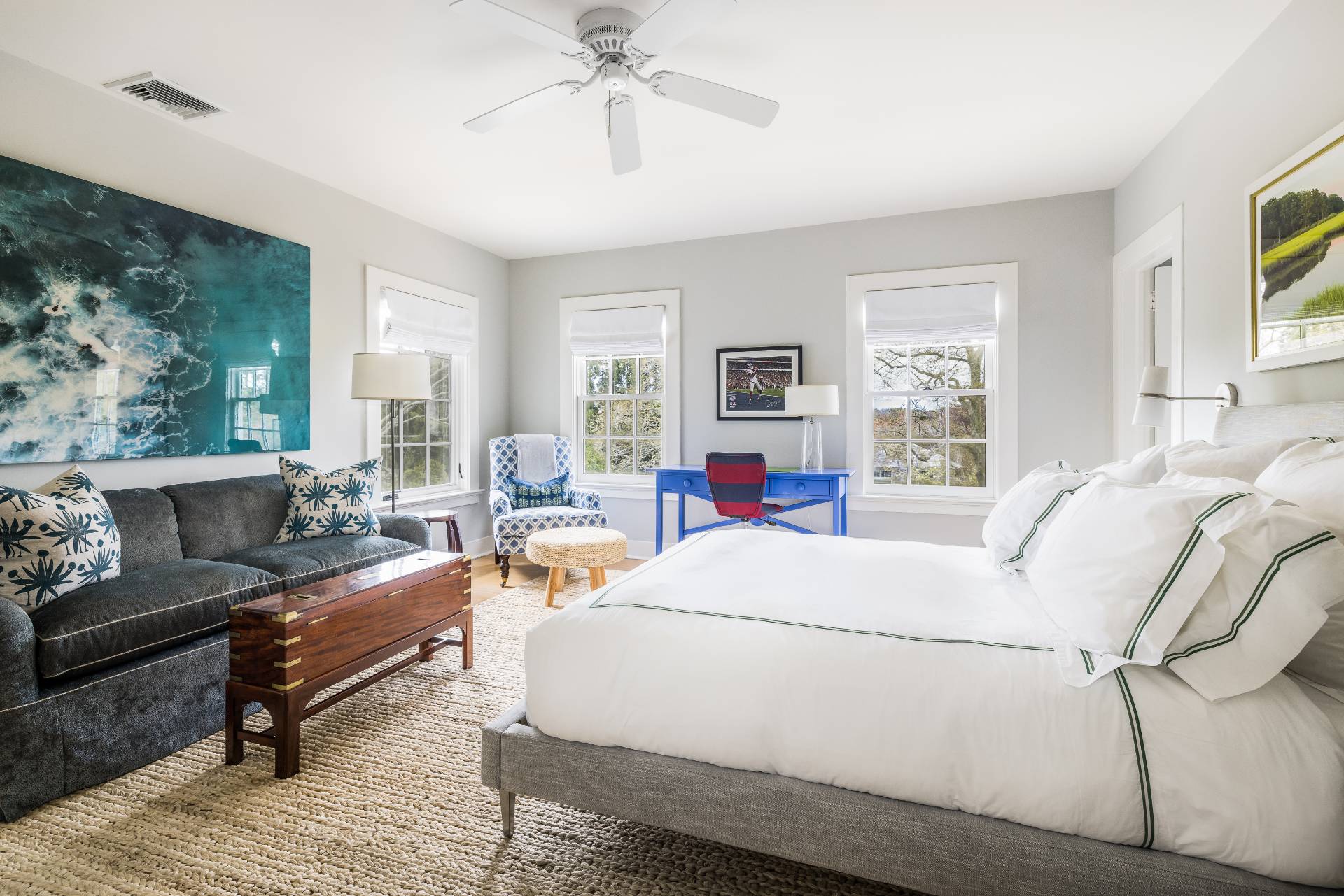 17 Apaquogue Road East Hampton, NY 11937 - Photo 27 of 37 a living room with furniture a large window and a chandelier